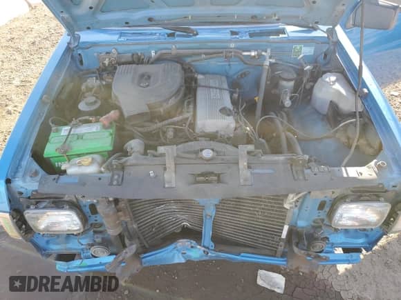 1995 Nissan Frontier z VIN 1N6SD11S5SC393060, wystawiony jako Copart lot #84612815 z przebiegiem 250 488 mil mil oraz Szkoda całkowita • Salvage title. Historia ofert i sprzedaży dostępna na DreamBid. Obrazek 11.