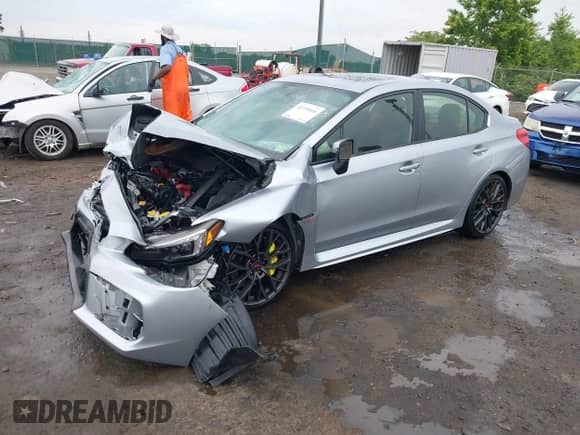 2019 Subaru WRX STI Limited z VIN JF1VA2V63K9807256, wystawiony jako IAAI lot #42390008 z przebiegiem 74 821 mil mil oraz . Historia ofert i sprzedaży dostępna na DreamBid. Obrazek 2.
