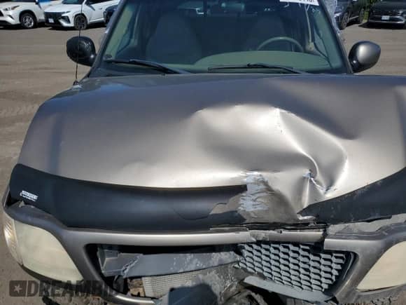 2001 Ford F-150 XL with VIN 1FTRX08L71KF02608, listed as a Copart auction lot 60115445 with 208,939 mi miles and Salvage title. Bid and sale history available at DreamBid. Image 11.