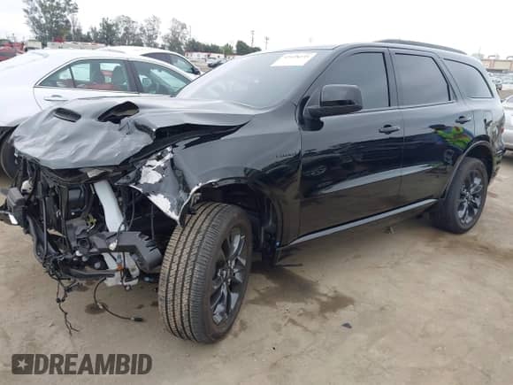 2025 Dodge Durango R/T Plus with VIN 1C4SDJCT6SC503445, listed as a IAAI auction lot 42428235 with 7,142 mi miles and . Bid and sale history available at DreamBid. Image 2.