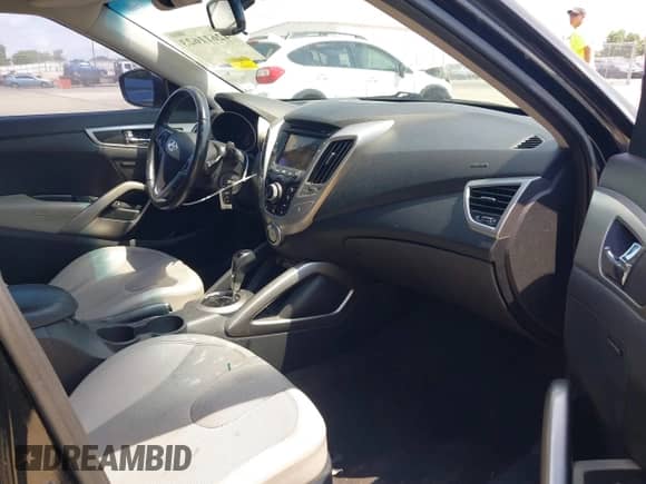 2012 Hyundai Veloster w/Black Int с VIN KMHTC6AD0CU056828, выставлен на аукционе IAAI как лот 42611623 с пробегом 136 242 миль миль и . История ставок и продаж доступна на DreamBid. Изображение 5.