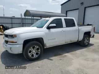 2017 Chevrolet Silverado 1500 LT z VIN 3GCUKREC3HG249466, wystawiony jako Copart lot #58291405 z przebiegiem 142 196 mil mil oraz Czysty tytuł • Clean title. Historia ofert i sprzedaży dostępna na DreamBid. Obrazek 1.