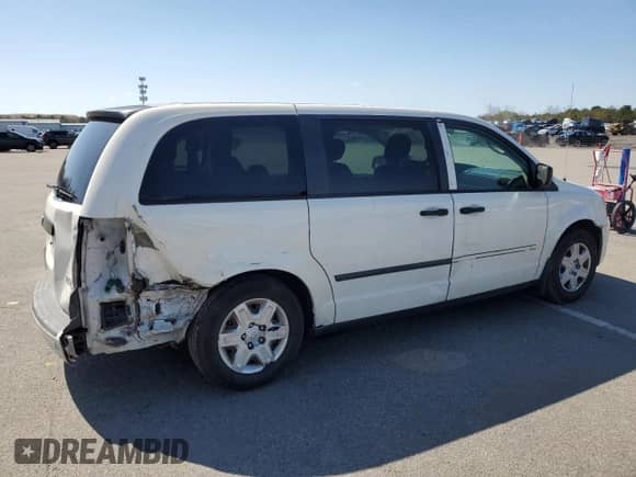 2009 Dodge Grand Caravan Cargo with VIN 2D4HN11E19R627123, listed as a Copart auction lot 51908535 with 254,195 mi miles and Salvage title. Bid and sale history available at DreamBid. Image 3.