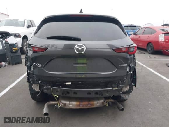 2022 Mazda CX-5 S Select z VIN JM3KFBBM2N0573466, wystawiony jako IAAI lot #42604117 z przebiegiem 35 729 mil mil oraz . Historia ofert i sprzedaży dostępna na DreamBid. Obrazek 17.