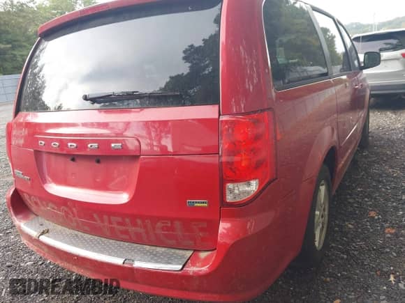 2012 Dodge Grand Caravan SXT with VIN 2C4RDGCG7CR296447, listed as a IAAI auction lot 43280546 with 55,551 mi miles and . Bid and sale history available at DreamBid. Image 4.