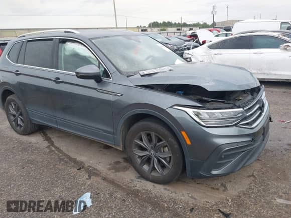 2023 Volkswagen Tiguan SE with VIN 3VV3B7AX4PM095392, listed as a IAAI auction lot 42830053 with 14,674 mi miles and . Bid and sale history available at DreamBid. Image 1.