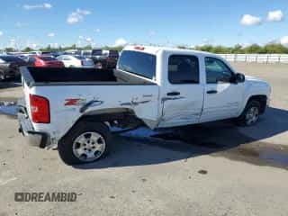 2012 Chevrolet Silverado 1500 LT with VIN 3GCPKSE78CG256607, listed as a Copart auction lot 82446975 with 183,529 mi miles and Salvage title. Bid and sale history available at DreamBid. Image 3.