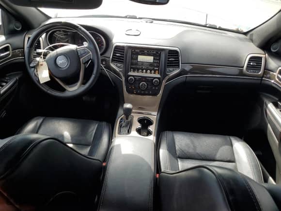 2017 Jeep Grand Cherokee Overland with VIN 1C4RJECG4HC740042, listed as a Copart auction lot 83797275 with 67,534 mi miles and Salvage title. Bid and sale history available at DreamBid. Image 8.