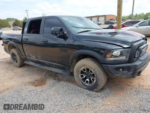2018 Ram 1500 Rebel with VIN 1C6RR7YT4JS151036, listed as a IAAI auction lot 41988370 with 72,587 mi miles and . Bid and sale history available at DreamBid. Image 1.