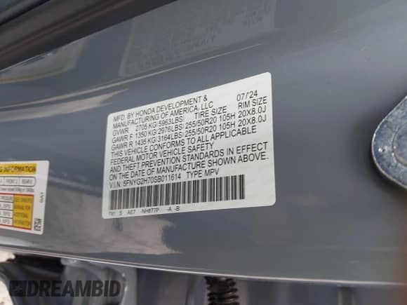 2025 Honda Pilot Touring with VIN 5FNYG2H70SB011614, listed as a IAAI auction lot 42205848 with 37,719 mi miles and . Bid and sale history available at DreamBid. Image 9.