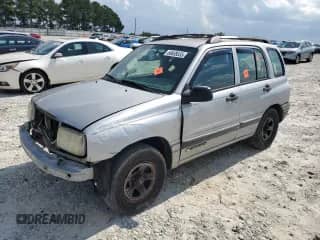 2002 Chevrolet Tracker с VIN 2CNBE13C826912290, выставлен на аукционе Copart как лот 69659335 с пробегом 153 495 миль миль и Списание • Salvage title. История ставок и продаж доступна на DreamBid. Изображение 1.