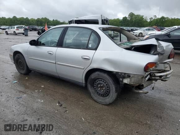 2005 Chevrolet Malibu Classic z VIN 1G1ND52F45M172291, wystawiony jako Copart lot #58258095 z przebiegiem 151 002 mil mil oraz Szkoda całkowita • Salvage title. Historia ofert i sprzedaży dostępna na DreamBid. Obrazek 2.