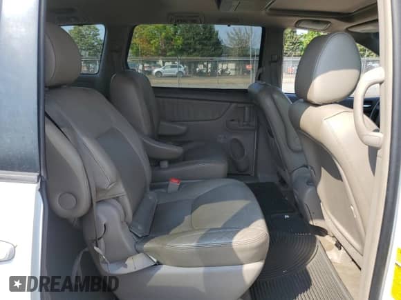 2010 Toyota Sienna XLE с VIN 5TDYK4CC2AS312328, выставлен на аукционе Copart как лот 71203025 с пробегом 182 360 миль миль и Списание • Salvage title. История ставок и продаж доступна на DreamBid. Изображение 11.