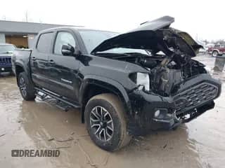 2023 Toyota Tacoma SR z VIN 3TMCZ5AN1PM545299, wystawiony jako IAAI lot #41678200 z przebiegiem 39 091 mil mil oraz . Historia ofert i sprzedaży dostępna na DreamBid. Obrazek 1.