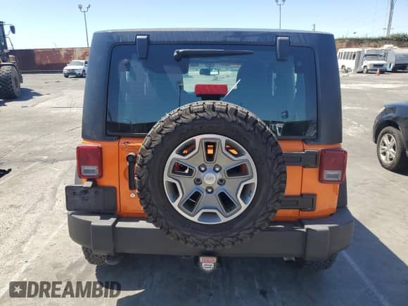 2013 Jeep Wrangler Rubicon 10th Anniversary with VIN 1C4BJWCG5DL502038, listed as a Copart auction lot 64360255 with 46,288 mi miles and Salvage title. Bid and sale history available at DreamBid. Image 6.