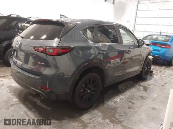 2022 Mazda CX-5 S Preferred z VIN JM3KFBCM0N1585446, wystawiony jako IAAI lot #42393723 z przebiegiem 70 131 mil mil oraz . Historia ofert i sprzedaży dostępna na DreamBid. Obrazek 4.