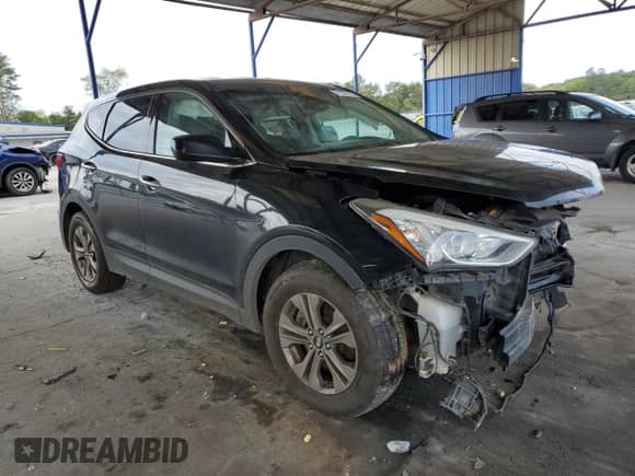 2015 Hyundai Santa Fe with VIN 5XYZTDLB3FG297609, listed as a Copart auction lot 71731775 with 193,122 mi miles and Salvage title. Bid and sale history available at DreamBid. Image 4.