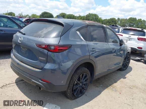 2023 Mazda CX-5 S Preferred z VIN JM3KFBCM2P0233638, wystawiony jako IAAI lot #42915682 z przebiegiem 62 982 mil mil oraz . Historia ofert i sprzedaży dostępna na DreamBid. Obrazek 4.