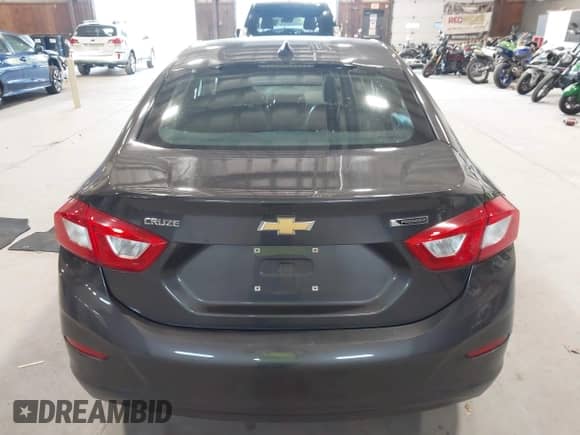 2017 Chevrolet Cruze Premier z VIN 1G1BF5SM9H7204702, wystawiony jako IAAI lot #43124653 z przebiegiem 153 993 mil mil oraz . Historia ofert i sprzedaży dostępna na DreamBid. Obrazek 16.
