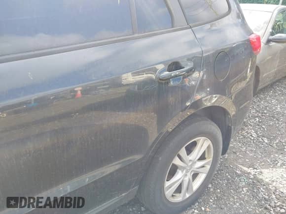 2012 Hyundai Santa Fe SE с VIN 5XYZHDAG7CG165058, выставлен на аукционе IAAI как лот 43155557 с пробегом Не указан миль и . История ставок и продаж доступна на DreamBid. Изображение 6.