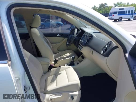 2015 Volkswagen Tiguan S with VIN WVGAV7AX4FW506314, listed as a IAAI auction lot 42063584 with 143,939 mi miles and . Bid and sale history available at DreamBid. Image 5.