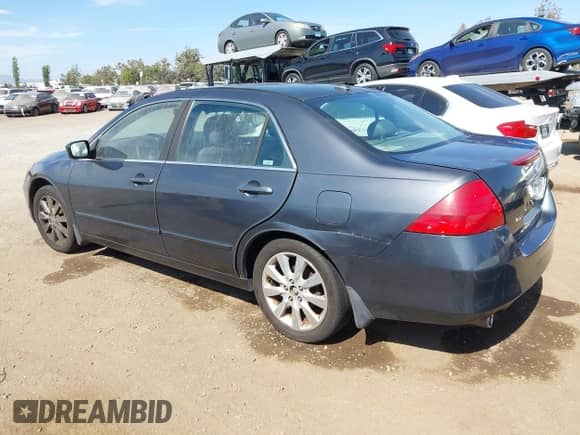 2006 Honda Accord EX-L with VIN 1HGCM66506A071775, listed as a IAAI auction lot 43053877 with 209,077 mi miles and . Bid and sale history available at DreamBid. Image 3.