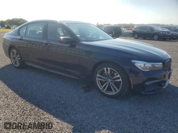 2018 BMW 7 Series 740e xDrive z VIN WBA7J2C52JG938439, wystawiony jako Copart lot #69452044 z przebiegiem 38 451 mil mil oraz Szkoda całkowita • Salvage title. Historia ofert i sprzedaży dostępna na DreamBid. Obrazek 4.