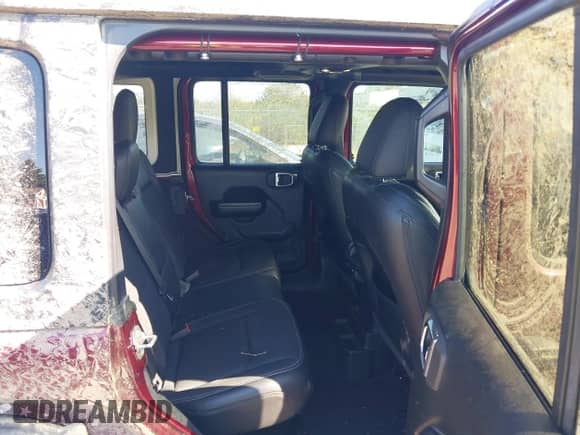 2021 Jeep Wrangler Unlimited 80th Anniversary with VIN 1C4HJXDG6MW627529, listed as a IAAI auction lot 43076902 with 45,168 mi miles and . Bid and sale history available at DreamBid. Image 8.