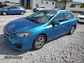 2017 Subaru Impreza Premium z VIN 4S3GTAD68H3707562, wystawiony jako Copart lot #80449955 z przebiegiem 53 674 mil mil oraz Szkoda całkowita • Salvage title. Historia ofert i sprzedaży dostępna na DreamBid. Obrazek 1.