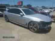 2016 BMW 7 Series 750i xDrive с VIN WBA7F2C59GG417311, выставлен на аукционе Copart как лот 61777655 с пробегом 103 374 миль миль и Списание • Salvage title. История ставок и продаж доступна на DreamBid. Изображение 4.