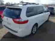 2015 Toyota Sienna LE with VIN 5TDKK3DC9FS574529, listed as a IAAI auction lot 43378279 with 169,347 mi miles and . Bid and sale history available at DreamBid. Image 4.