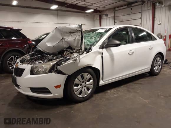 2014 Chevrolet Cruze LS with VIN 1G1PB5SH7E7143110, listed as a IAAI auction lot 42486209 with 92,277 mi miles and . Bid and sale history available at DreamBid. Image 2.