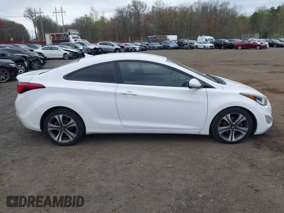 2014 Hyundai Elantra with VIN KMHDH6AH7EU025555, listed as a IAAI auction lot 42080211 with 95,333 mi miles and . Bid and sale history available at DreamBid. Image 13.