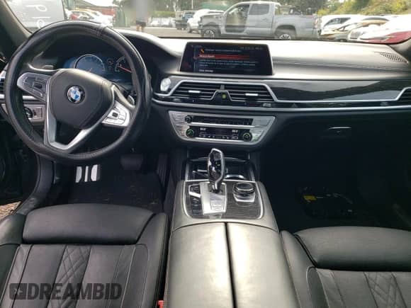 2016 BMW 7 Series 740i with VIN WBA7E2C54GG738515, listed as a Copart auction lot 61997375 with Not provided miles and Clean title. Bid and sale history available at DreamBid. Image 8.