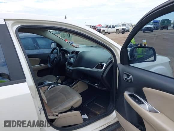 2014 Dodge Journey SE with VIN 3C4PDCABXET194003, listed as a IAAI auction lot 43274470 with 92,895 mi miles and . Bid and sale history available at DreamBid. Image 5.