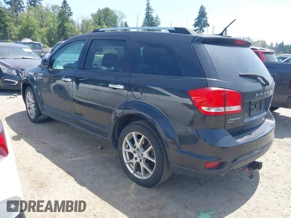 2013 Dodge Journey Crew with VIN 3C4PDDDG9DT539551, listed as a IAAI auction lot 42468362 with 200,829 mi miles and . Bid and sale history available at DreamBid. Image 3.