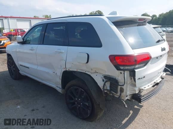 2020 Jeep Grand Cherokee Altitude with VIN 1C4RJFAG5LC126201, listed as a IAAI auction lot 43155385 with 75,215 mi miles and . Bid and sale history available at DreamBid. Image 3.