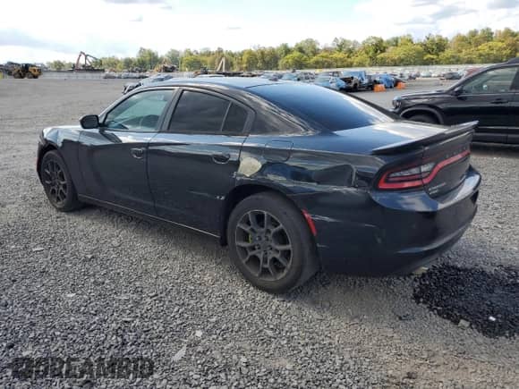 2015 Dodge Charger SE with VIN 2C3CDXFG1FH762857, listed as a Copart auction lot 70939295 with 170,821 mi miles and Salvage title. Bid and sale history available at DreamBid. Image 2.