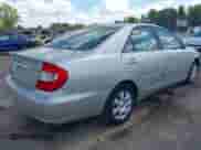 2003 Toyota Camry LE with VIN 4T1BE32K33U165706, listed as a IAAI auction lot 43134674 with 258,478 mi miles and . Bid and sale history available at DreamBid. Image 4.