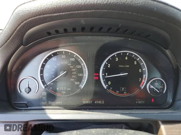 2010 BMW 7 Series 750Li xDrive with VIN WBAKC8C59AC430192, listed as a Copart auction lot 64105935 with 103,657 mi miles and Salvage title. Bid and sale history available at DreamBid. Image 9.