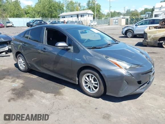 2016 Toyota Prius Two with VIN JTDKBRFU7G3009384, listed as a IAAI auction lot 43037087 with 142,384 mi miles and . Bid and sale history available at DreamBid. Image 1.