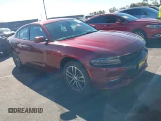 2019 Dodge Charger SXT with VIN 2C3CDXJG2KH757927, listed as a IAAI auction lot 43162261 with 132,377 mi miles and . Bid and sale history available at DreamBid. Image 1.