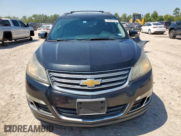 2015 Chevrolet Traverse LT with VIN 1GNKRGKDXFJ153583, listed as a Copart auction lot 70761345 with 164,628 mi miles and Salvage title. Bid and sale history available at DreamBid. Image 5.