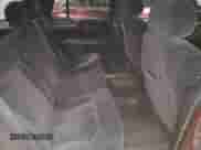 2000 Chevrolet Blazer LS z VIN 1GNDT13W9Y2286713, wystawiony jako Copart lot #66049995 z przebiegiem 200 735 mil mil oraz Szkoda całkowita • Salvage title. Historia ofert i sprzedaży dostępna na DreamBid. Obrazek 11.