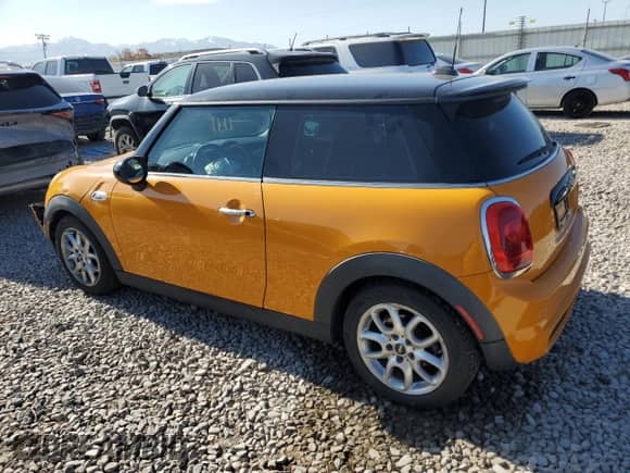 2015 MINI Hardtop S with VIN WMWXP7C51F2A36092, listed as a Copart auction lot 58079205 with 81,470 mi miles and Salvage title. Bid and sale history available at DreamBid. Image 2.