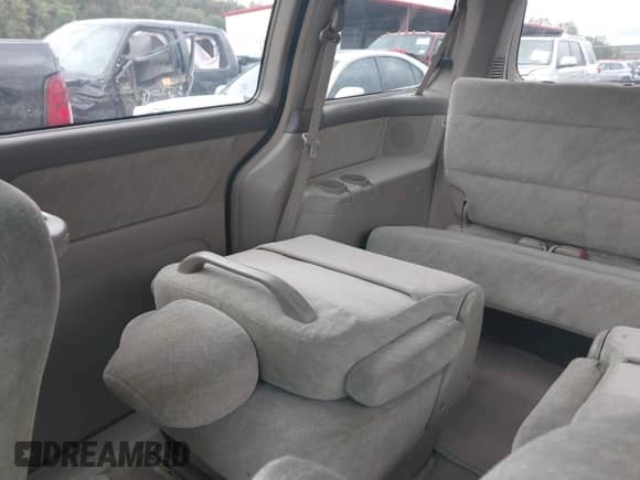 2001 Honda Odyssey EX with VIN 2HKRL18611H606344, listed as a IAAI auction lot 43288012 with 199,590 mi miles and . Bid and sale history available at DreamBid. Image 8.