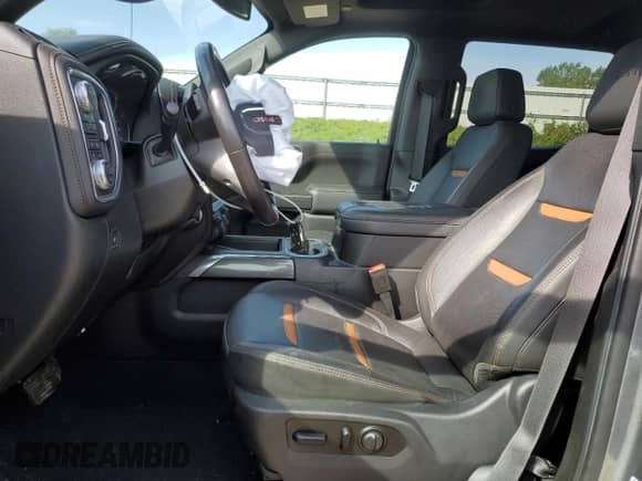 2021 GMC Sierra 1500 AT4 with VIN 1GTP9EED5MZ299046, listed as a Copart auction lot 71597315 with 77,978 mi miles and Salvage title. Bid and sale history available at DreamBid. Image 7.