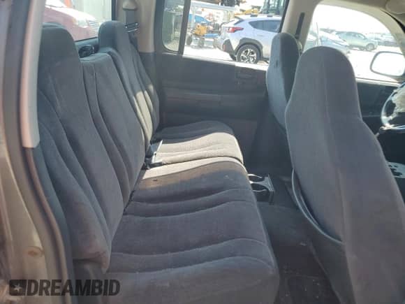 2002 Dodge Dakota SLT z VIN 1B7HL48N22S719551, wystawiony jako Copart lot #61735845 z przebiegiem 210 712 mil mil oraz Czysty tytuł • Clean title. Historia ofert i sprzedaży dostępna na DreamBid. Obrazek 10.