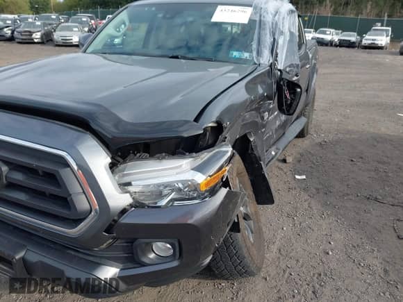 2021 Toyota Tacoma SR with VIN 3TMCZ5AN7MM383352, listed as a IAAI auction lot 43246296 with 44,937 mi miles and . Bid and sale history available at DreamBid. Image 6.
