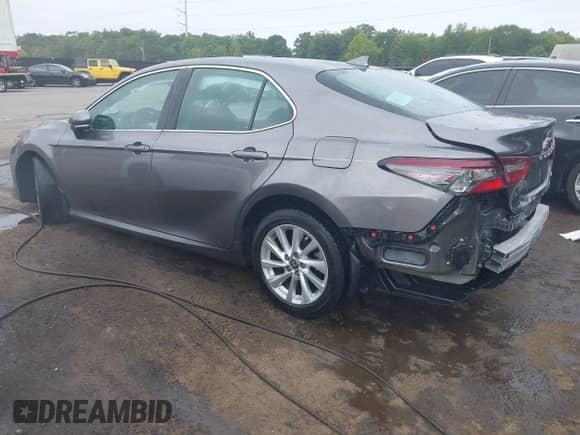 2023 Toyota Camry LE z VIN 4T1C11AK3PU141255, wystawiony jako IAAI lot #42938395 z przebiegiem 59 258 mil mil oraz . Historia ofert i sprzedaży dostępna na DreamBid. Obrazek 3.